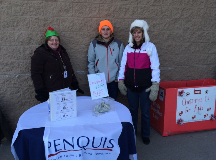 Child Development team members participating in a Penquis event to raise funds for the "Christmas is for Kids" program, spreading holiday cheer to families in need.